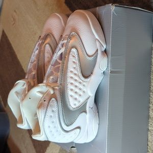 Jordan Women’s White and Silver Leather Sneakers